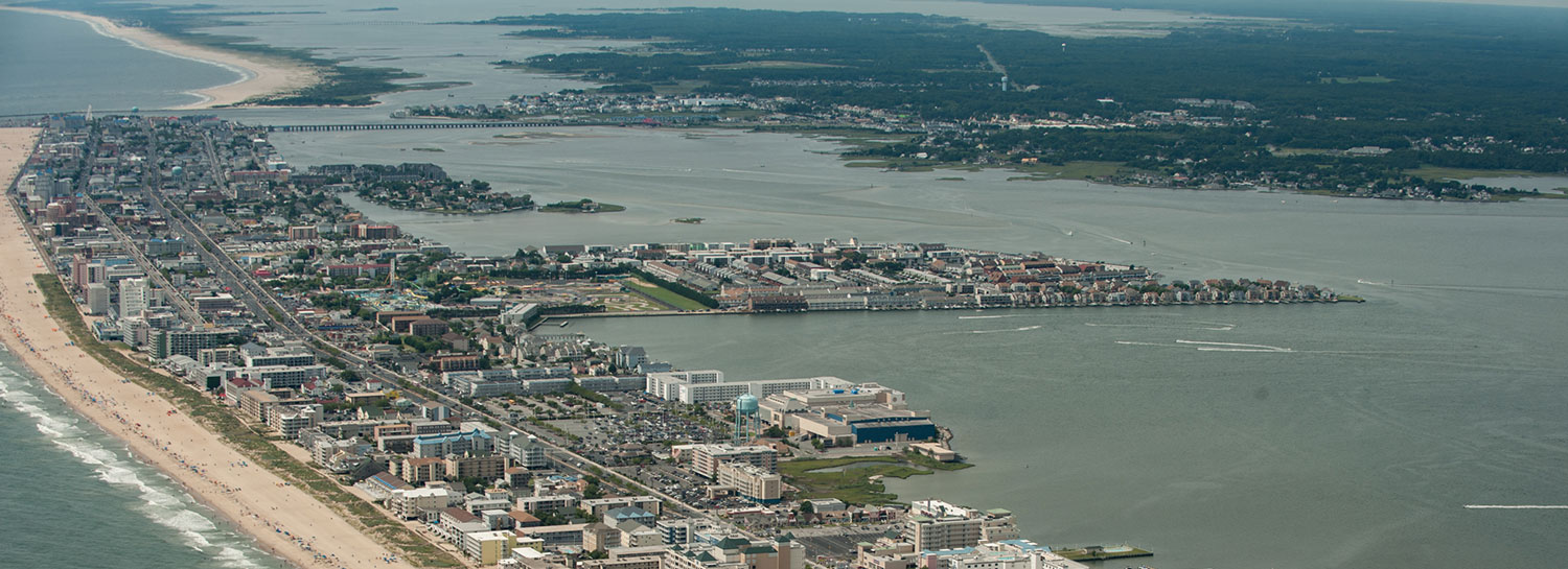 Aerial view of Ocean City, Atlantic ocean beach, and Assawoman Bay