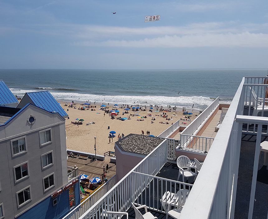 Beach and boardwalk view from balcony